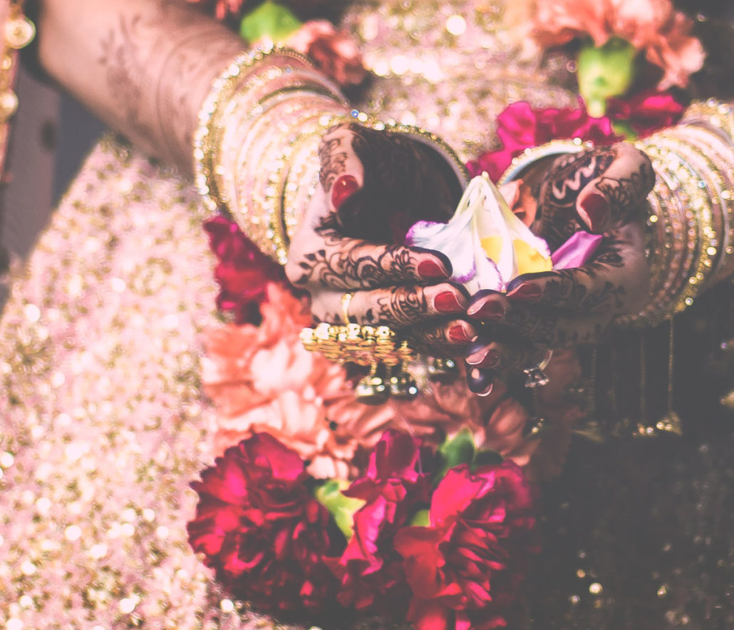 bride covered in henne following societal norms